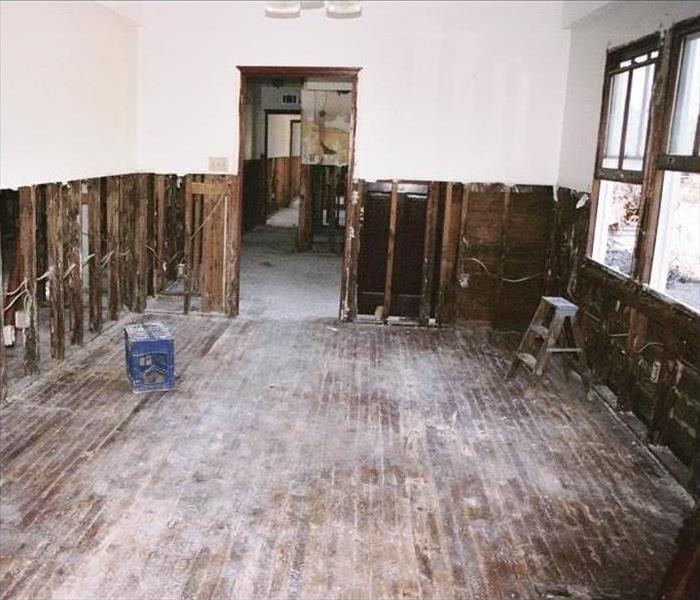 Old home with wood floors and flood cut in the wall