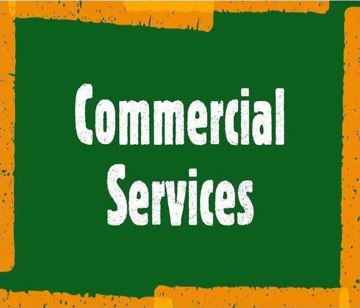 Green, orange and white COMMERCIAL SERVICES picture